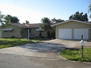 Example of a Cape Coral Gulf access waterfront home in the Cape Coral Yacht Club neighborhood behind a bridge